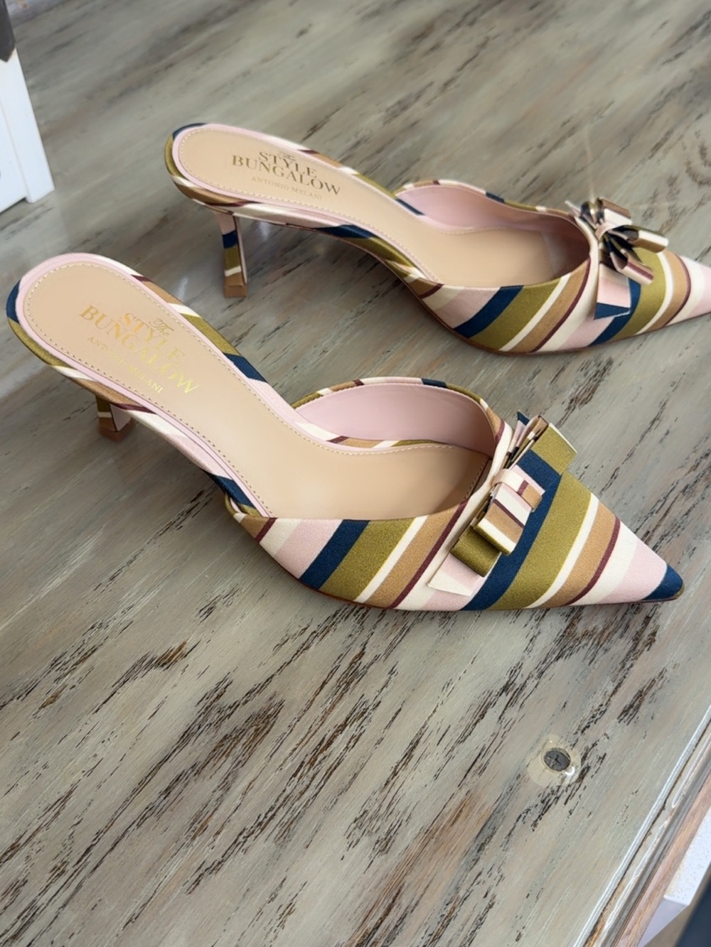 ANTONIO MELANI x the bungalow style Striped Pointed-Toe Bow Mules